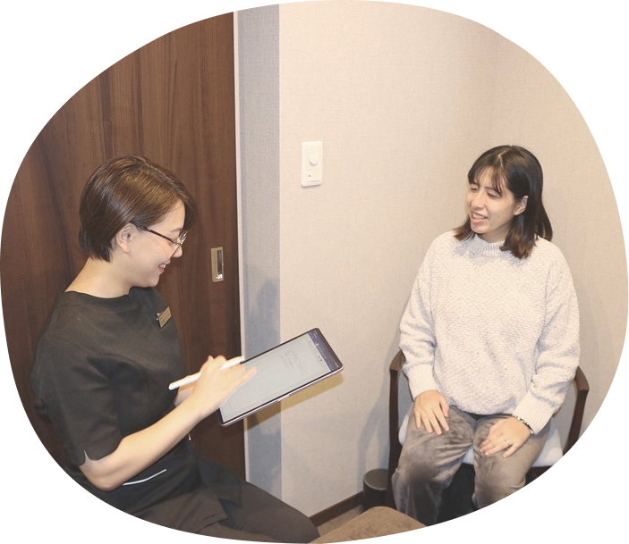 女性施術者と女性患者